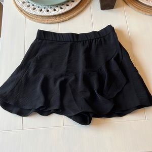 Love tree black skort with ruffle across the front!